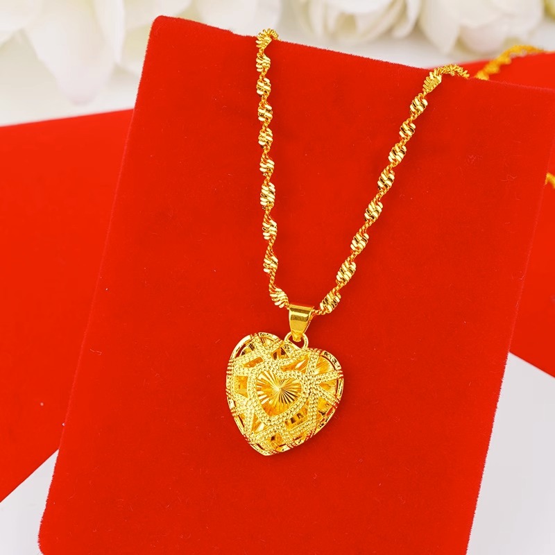 Hollow heart-shaped pendant cl - Photography Yellow recension och pris